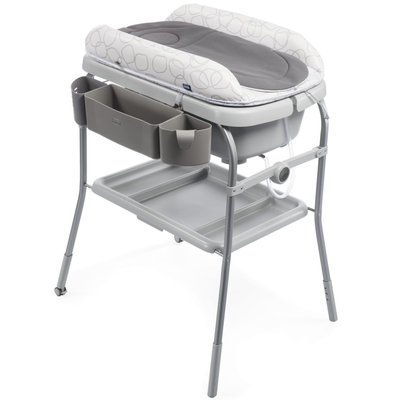 A changing table with a bath Chicco